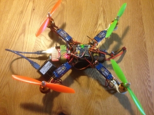 Arduino UNO with USB Host Shield mounted on quadcopter frame